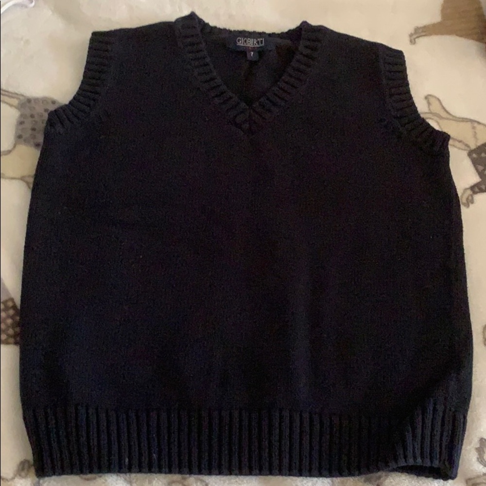 Knitted cotton navy blue vest.